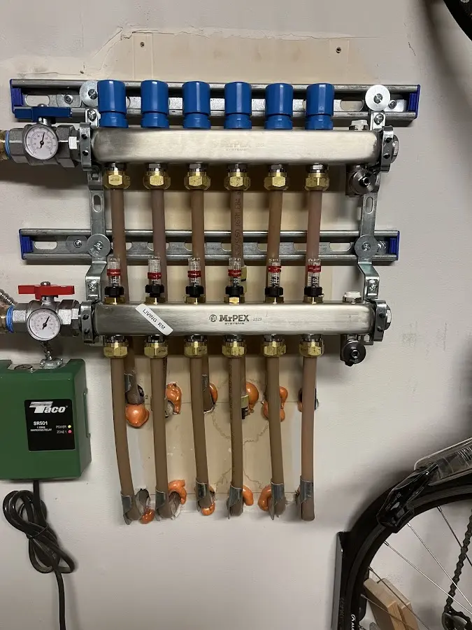 Plumber performing Gas Leak Detection at a residential property in Southbury